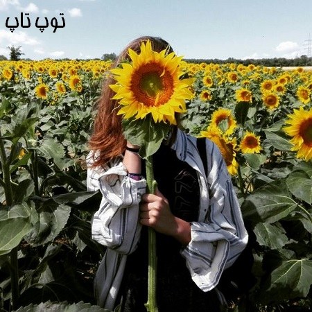 دانلود عکس دختر با گل در دست